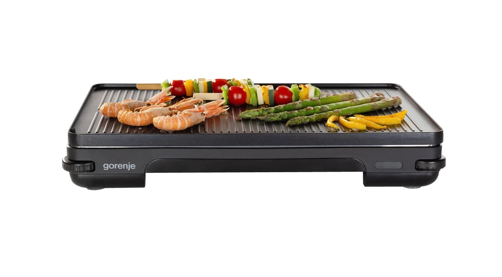 Grill stołowy TG2000LCB GORENJE o wymiarach 32x48 cm to nieodłączny towarzych przyjęć i uroczystości. Pozwoli Ci na realizację przepisów kulinarnych, które zadowolą Twoich gości. 